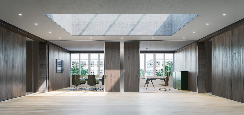 Ufficio direzionale con pareti divisorie vetrate e sala riunioni